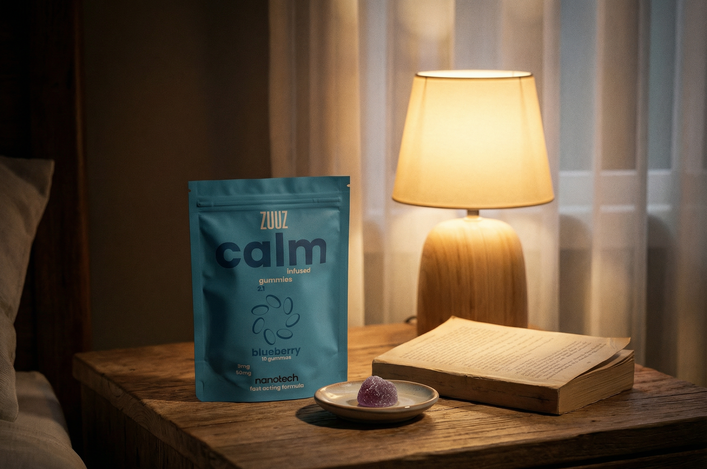 Zuuz Calm product packaging on a bedside table with a lamp and book in a bedroom setting
